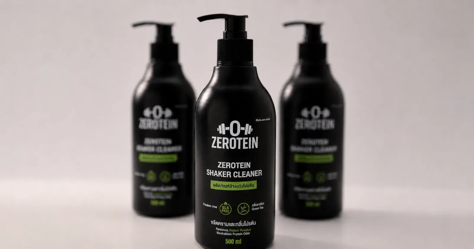 Three ZEROTEIN Shaker Cleaner bottles on a light background